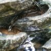 Indoor Stone-Look Water Fountain, 7 Tier Polyresin Cascading Rock Tabletop Fountain With LED Light - Gray - Image 4