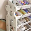 Multi Functional Kids Toy Storage Organizer Cabinet With Hdpe Shelf And 12 Bins - Gray White - Image 5