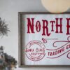 Iron / Wood North Pole Trading Company Wall Sign, For Christmas Holiday Table Wall Decor - White / Red - Image 5