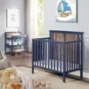 Connelly - Mini Crib With Mattress Pad Midnight - Blue / Vintage Walnut - Image 4