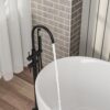 Freestanding Bathtub Faucet Floor Mount Tub Filler With Swivel Gooseneck Spout And Cylinder Handheld - Matte Black - Image 6
