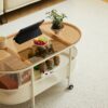 Movable Oval Metal Glass Coffee Table With Storage - White - Image 13