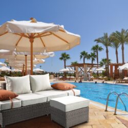 Salena - All Weather Wicker Patio Sofa & Ottoman With 2 Toss Pillows - Beige / Gray