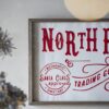 Iron / Wood North Pole Trading Company Wall Sign, For Christmas Holiday Table Wall Decor - White / Red - Image 5