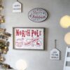 Iron / Wood North Pole Trading Company Wall Sign, For Christmas Holiday Table Wall Decor - White / Red - Image 2