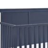 Connelly - Mini Crib With Mattress Pad Midnight - Blue / Vintage Walnut - Image 6