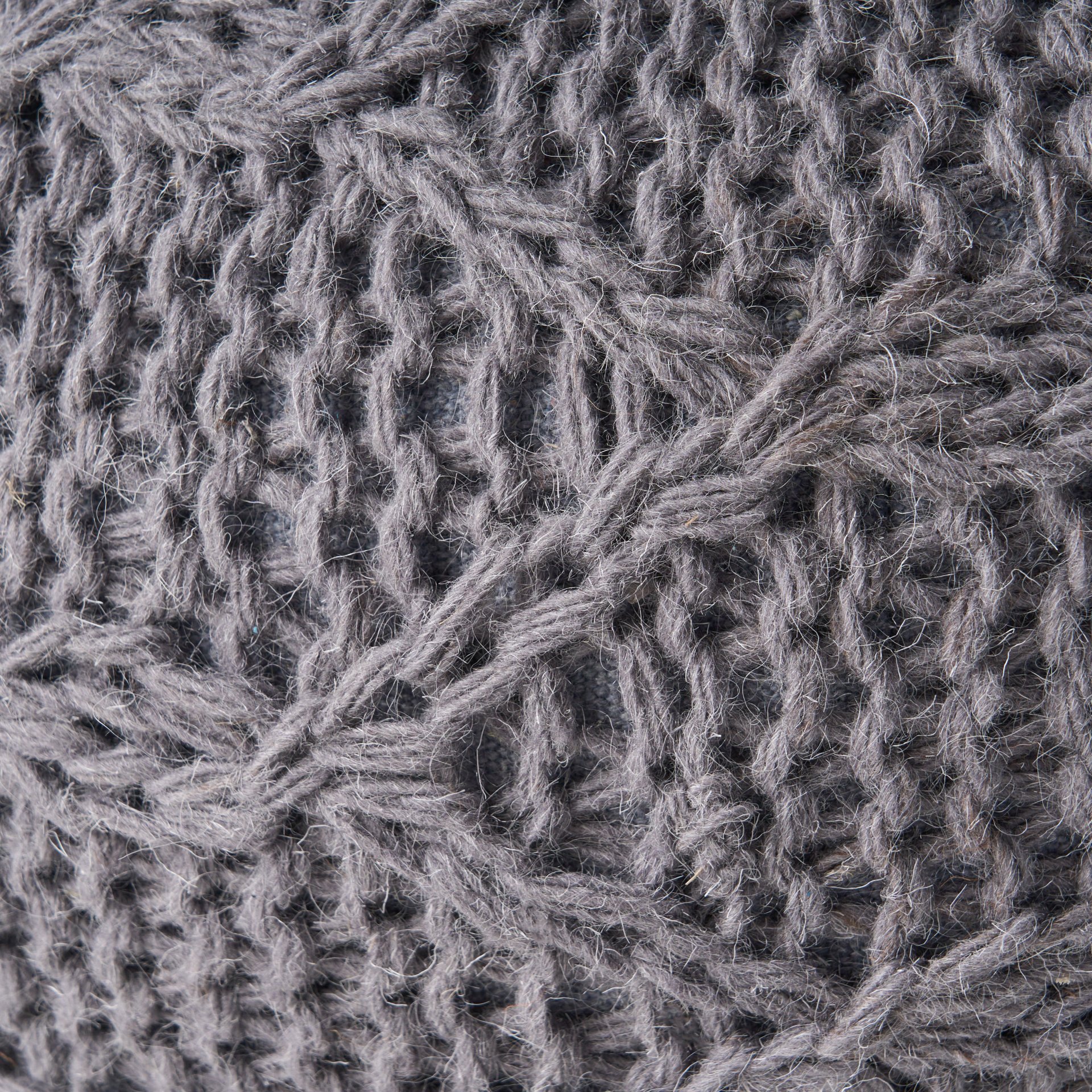 Malibu - Modern Knitted Wool Round Pouf With Handcrafted Design - Charcoal - Image 9